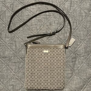 Coach Crossbody, Grey fabric with leather strap.